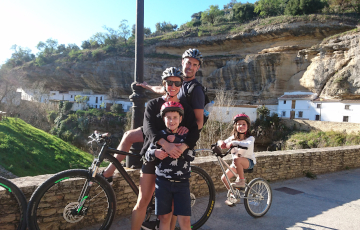 family riding in setenil