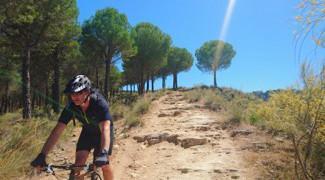 mountain biking along the rio guadiaro from ronda to jimera de libar in andalucia, spain