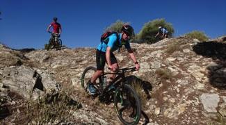 riding from ronda to el chorro near malaga on electric mountain bikes in andalucia, spain