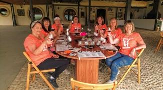 Walking group wine tasting in vineyard in Ronda, andalucia, Spain