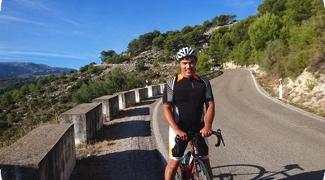 Road cyclist on road bike tour in Andalucia Spain