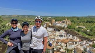 Cycling tour riders above Setenil de las Bodegas