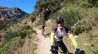 mountain biking along the rio guadiaro from cueva del gato to jimera de libar in andalucia, spain